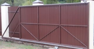 Купить откатные ворота из профнастила Северодвинск, цена от 1764 руб.